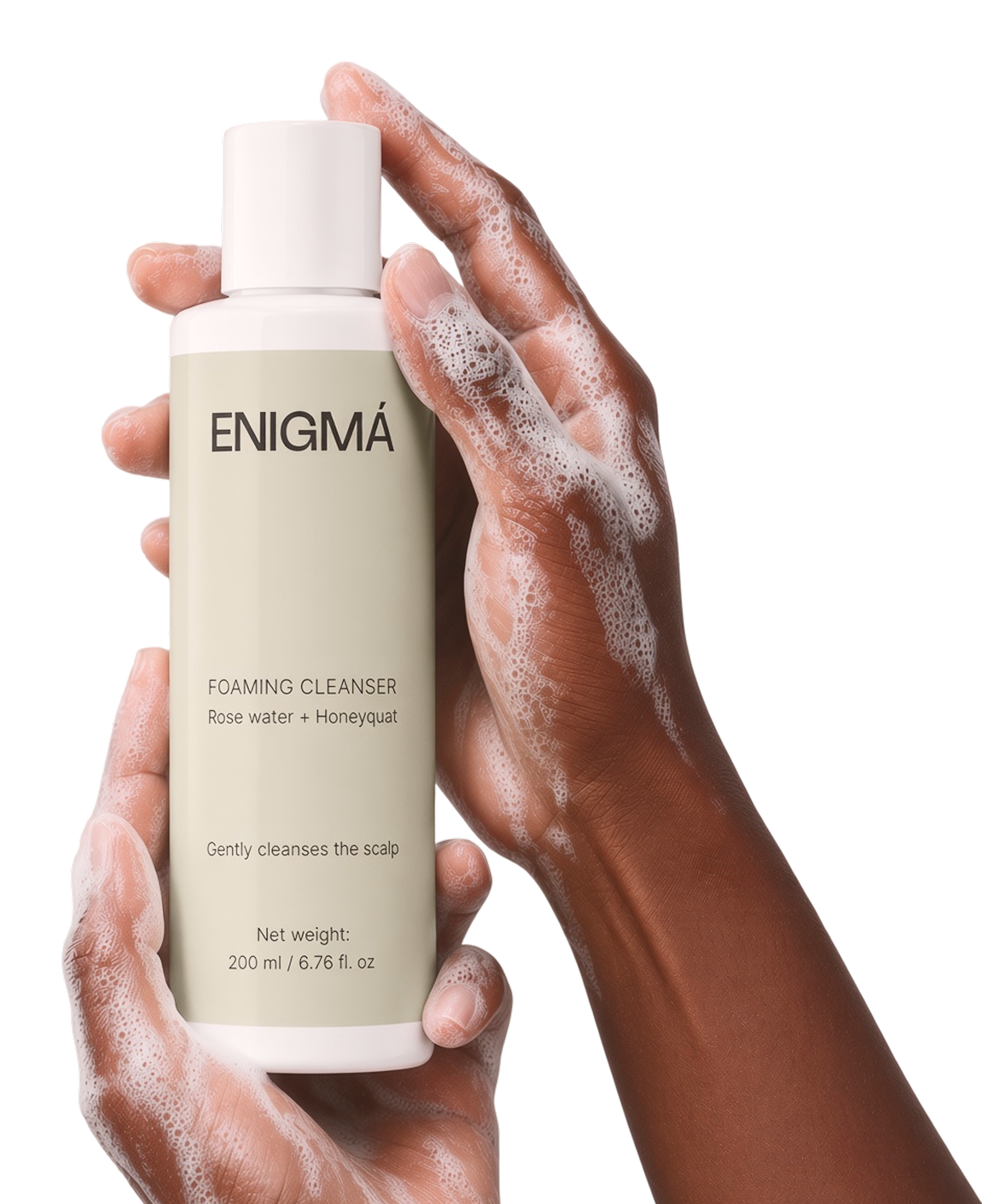 Enigma Foaming Cleanser held in hands with foam